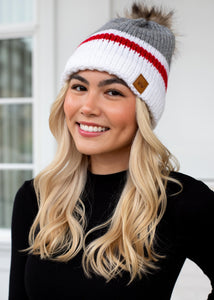 Grey and white color block with red stripe fleece lined knit hat with pom detail