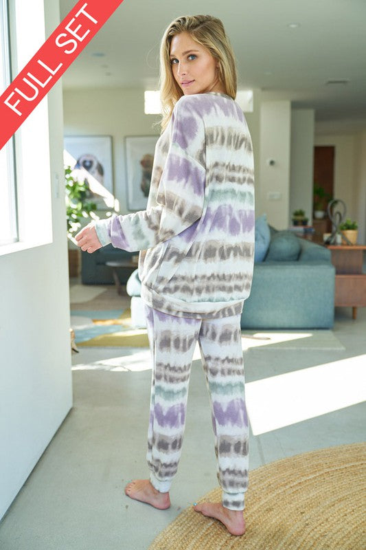A tie dye knit matching two piece set with a long sleeve