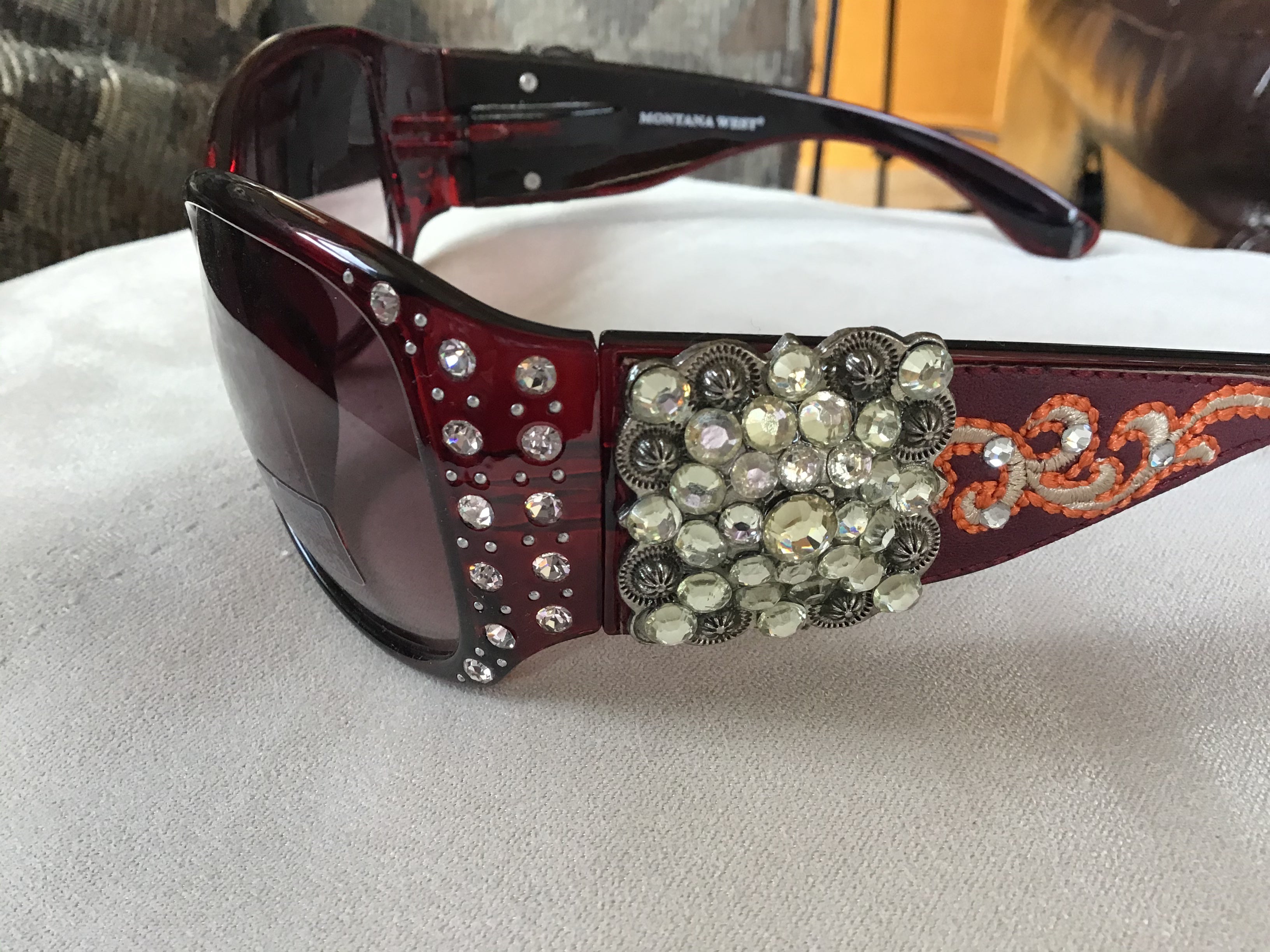 Gorgeous bling Concho studded UV 400 Montana west sunglasses Gorgeous chocolate brown, black, and a red burgundy you pick
