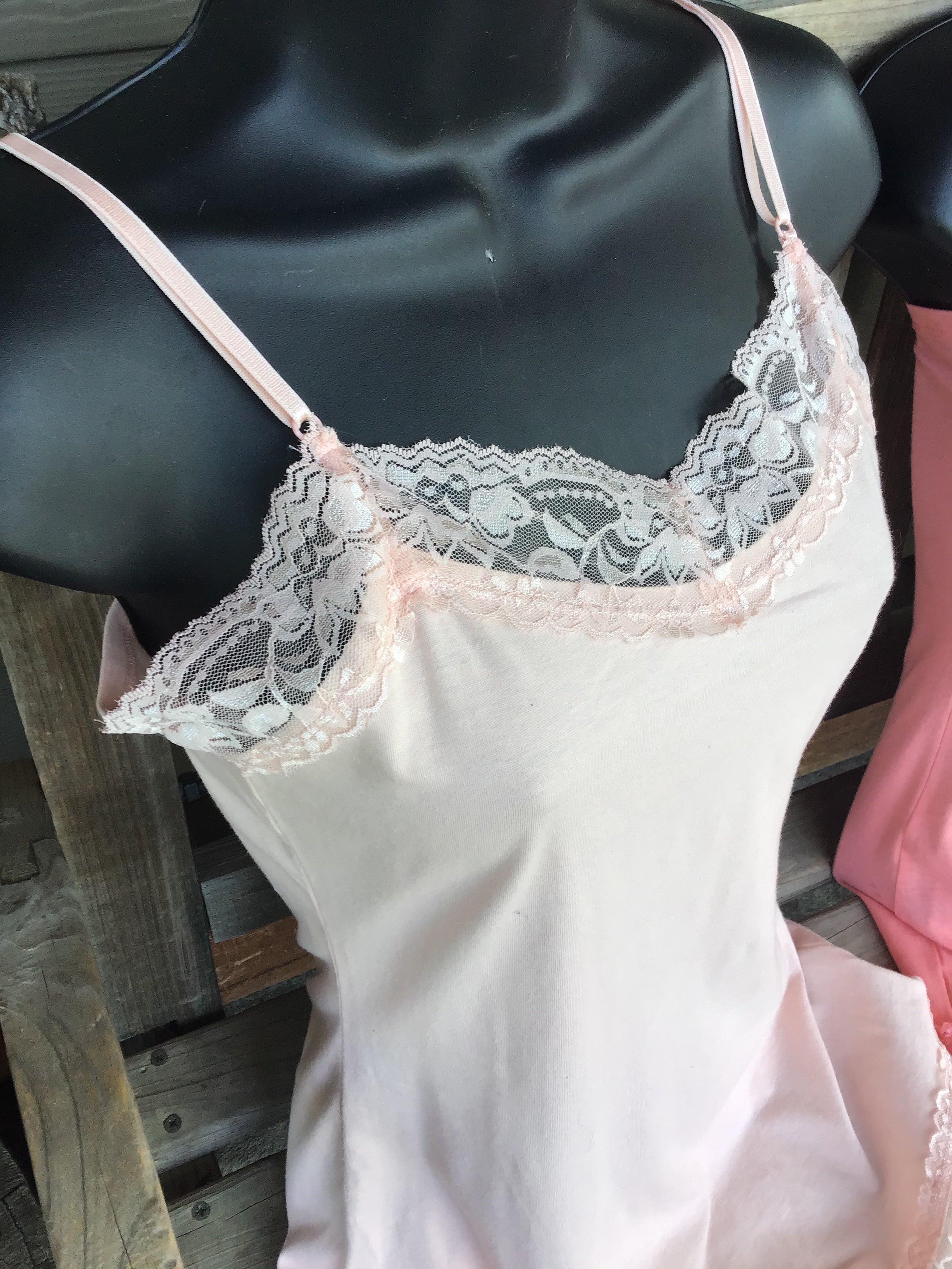 Fitted spaghetti strap top with lace detail. Junior Size. Colours soft peach coral and vibrant