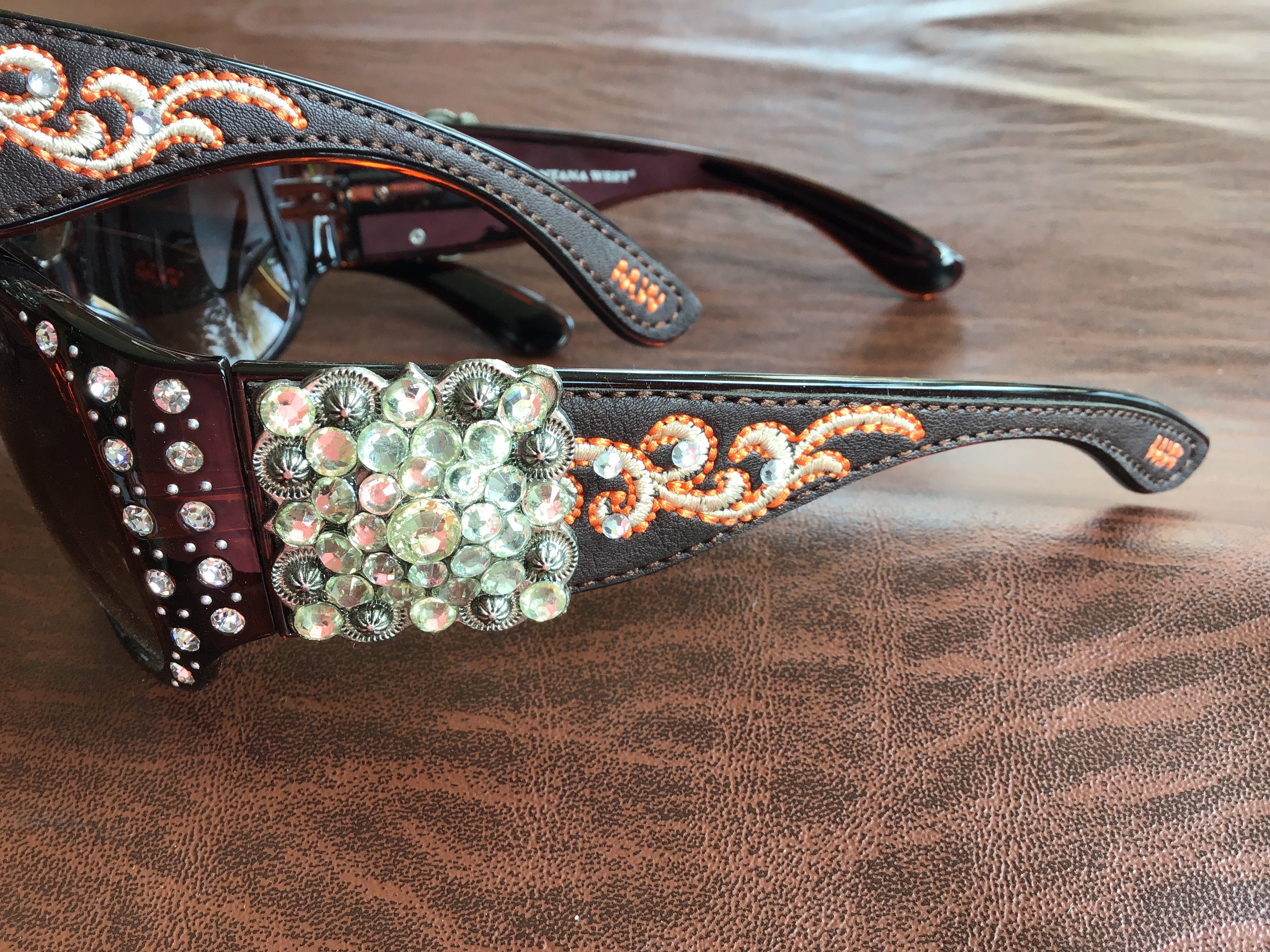 Gorgeous bling Concho studded UV 400 Montana west sunglasses Gorgeous chocolate brown, black, and a red burgundy you pick