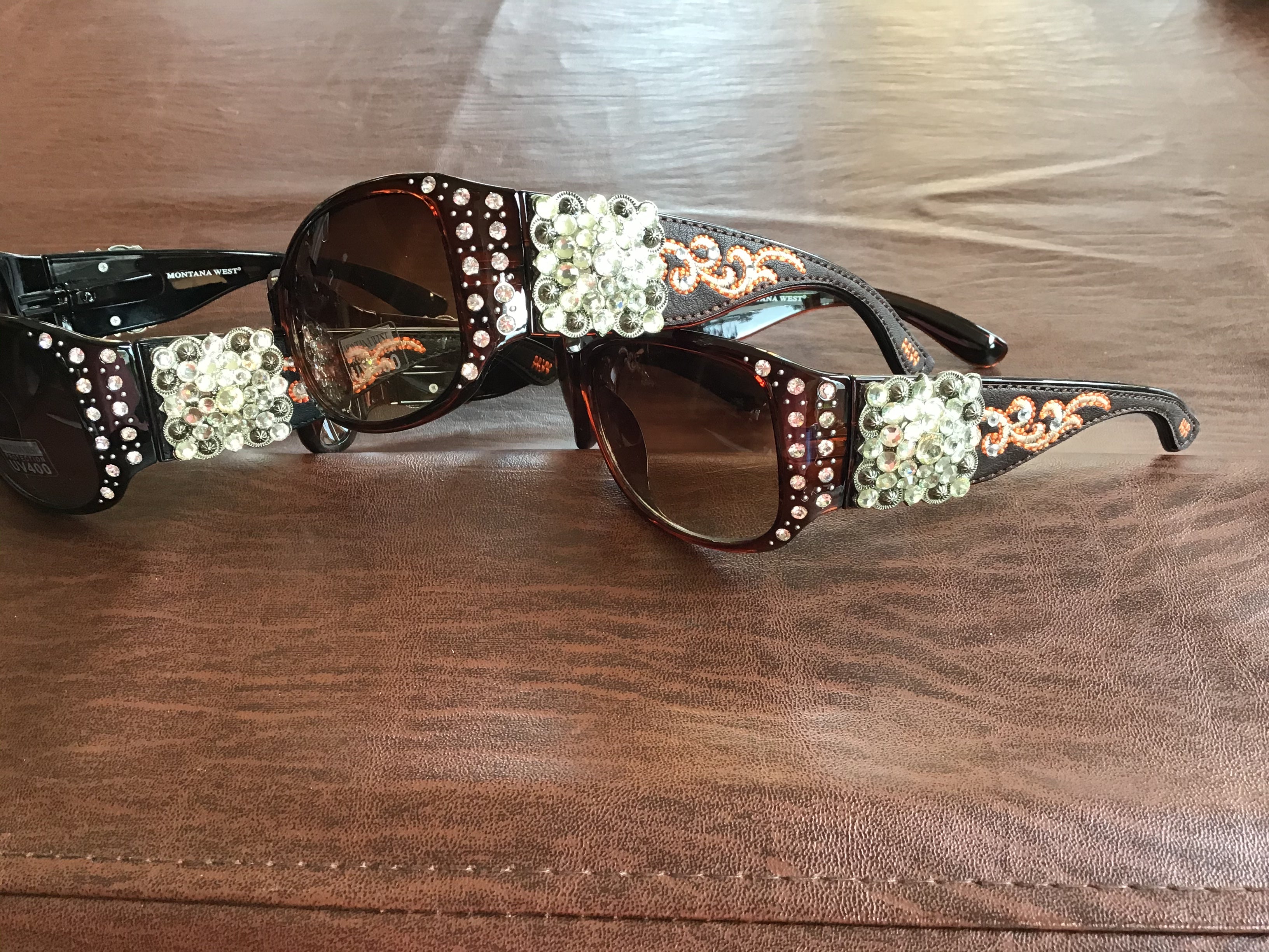Gorgeous bling Concho studded UV 400 Montana west sunglasses Gorgeous chocolate brown, black, and a red burgundy you pick