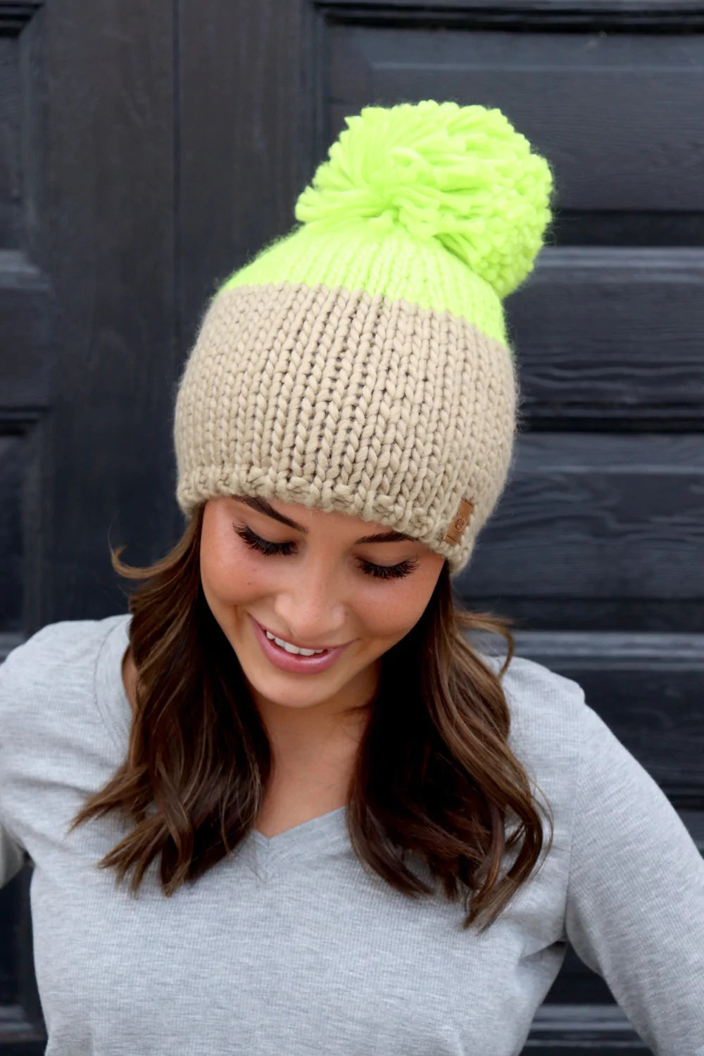 Neon green & tan color block knit hat with large pom accent Fleece lined