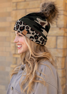 Leopard print knit hat Camo print trim Natural faux fur pom accent