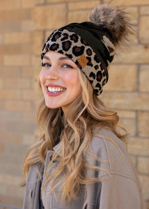 Camo print knit hat with Leopard print trim Natural faux fur pom accent