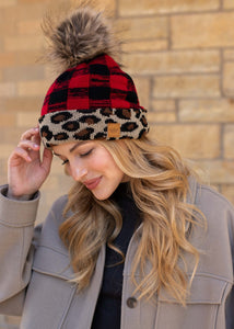 Fleece lined leopard and red plaid hat faux fur pom pom accent