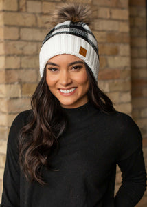 White and black buffalo plaid fleece lined knit hat with pom detail