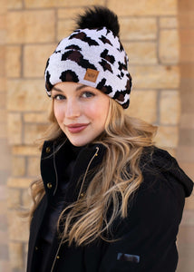 White leopard print knit hat Black faux fur pom accent Fleece lined