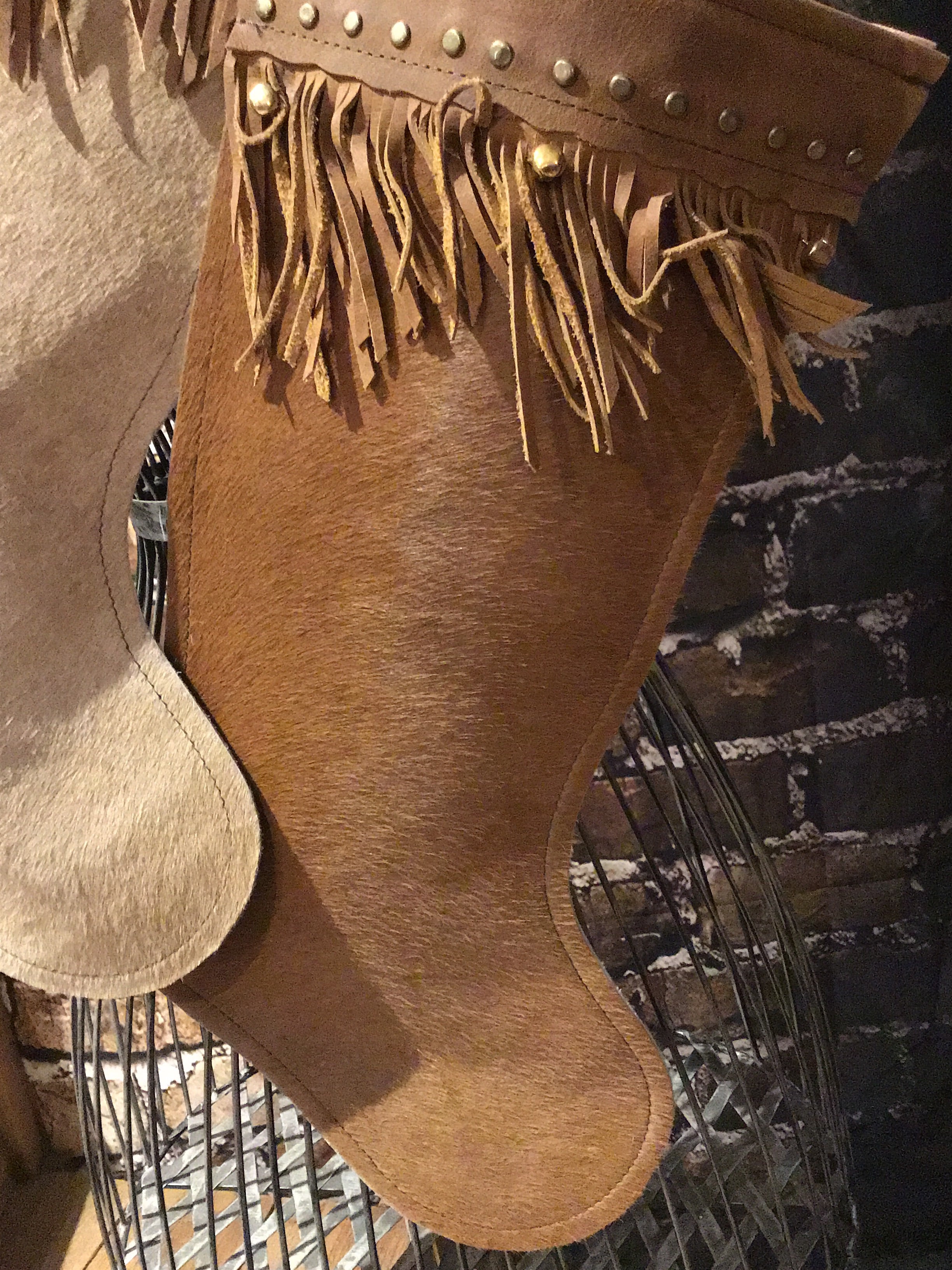 Cowhide Christmas stocking with bells